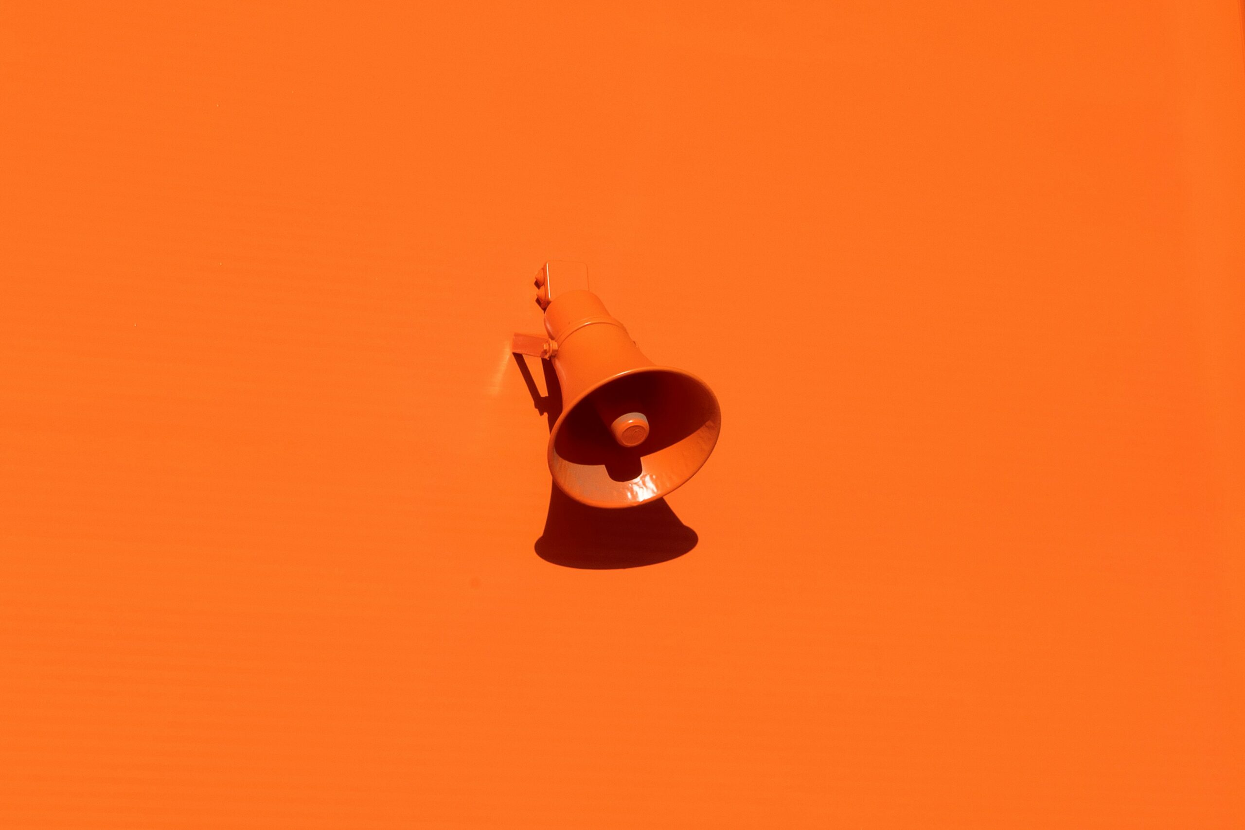 megaphone on orange background